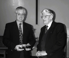 Darryl is presented with the CDs by Cedric